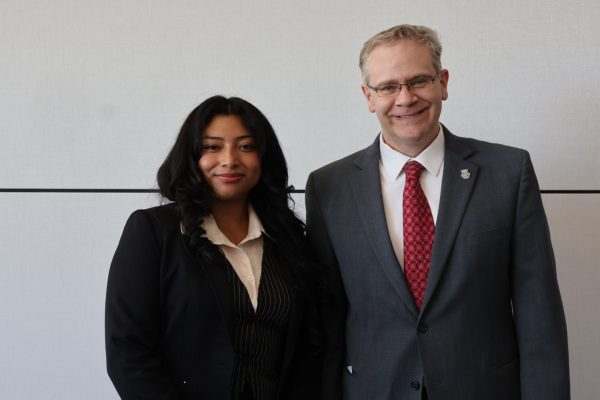 Pre-Law Fellow Scarlet Urey with her attorney mentor ​​Stephen Kelson.