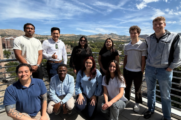 The LSAT Scholarship recipients and attorney Eli Leggett on the patio of Strong & Hanni.