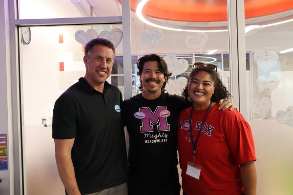Jascha Clark, John Arthur, and Sabrina Ruiz-Monroy pose for a picture.